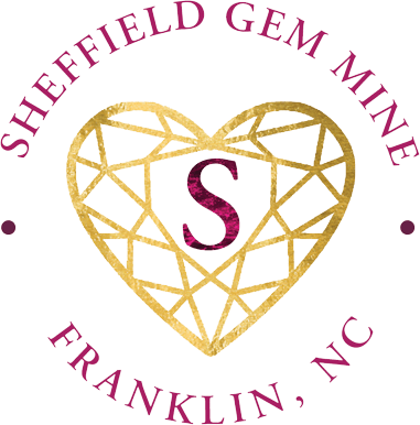 A green background with pink and gold letters.