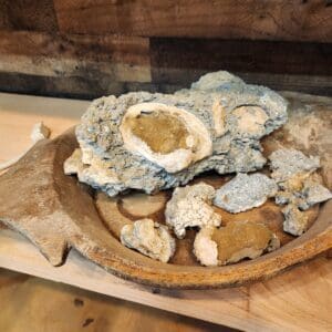 A plate of food on top of a wooden table.