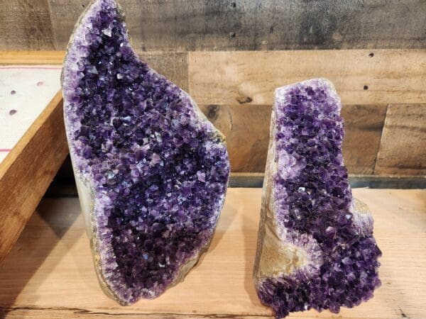 A purple rock with a large amount of amethyst on it