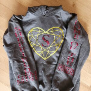 A gray hoodie with a heart on it.